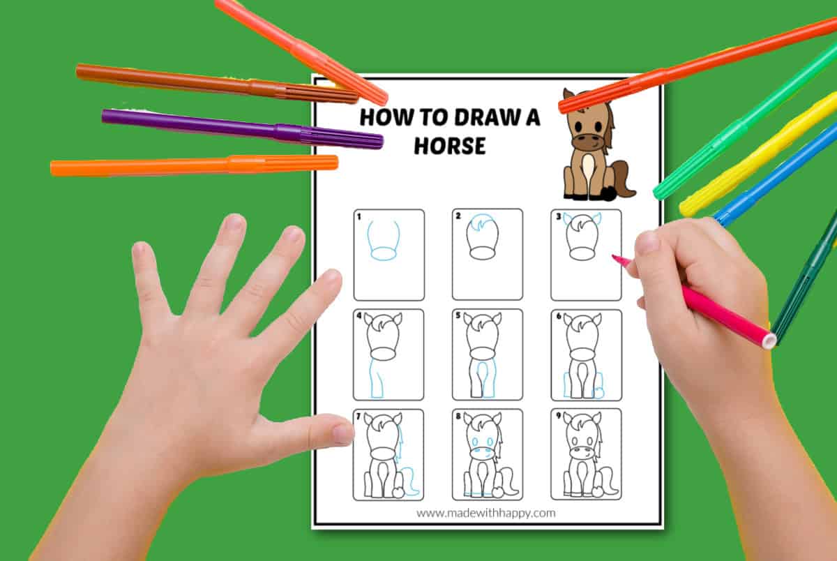 A child’s hand holds a pink pen, following step-by-step boxes on a How to Draw a Horse worksheet. Colorful markers and another hand rest on the green background, creating an inviting scene for learning to draw.