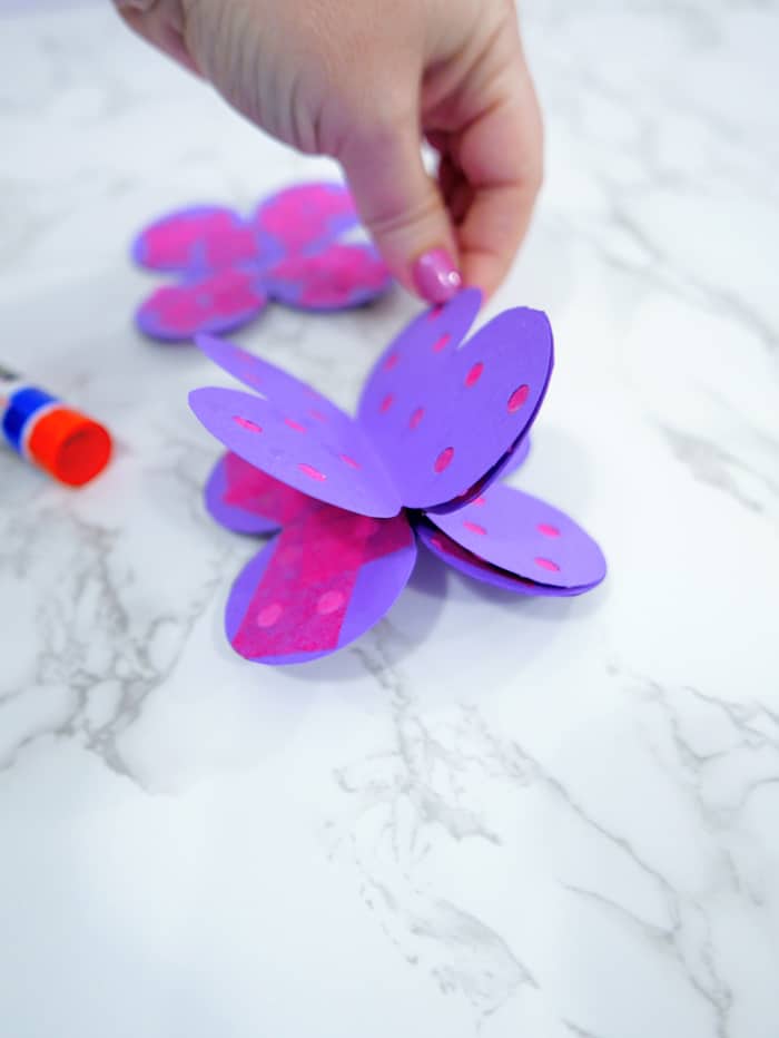 Bend paper butterfly in half