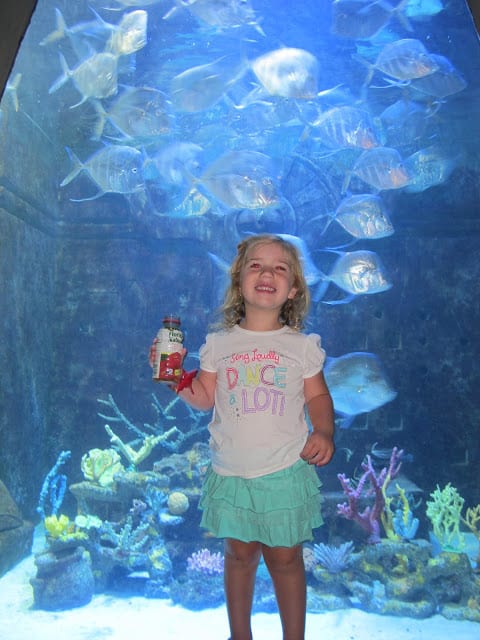 girl smiling at Atlantis Bahamas Aquarium