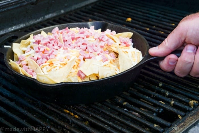 Simple and delicious ingredients to make these Campfire Nachos for your next camping trip or backyard BBQ. Camping Recipes. Simple campfire recipe ideas.