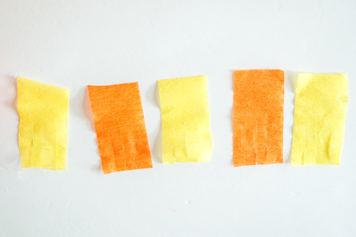 three piece of fringed crepe paper