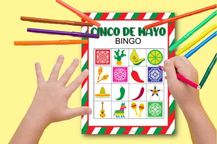 Child playing cinco de mayo bingo