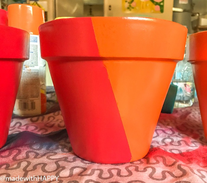 Colorblocking Terra Cotta Pots. Painting Pots Color Blocking Flower Pots. Rainbow Vertical Garden. Colorful garden pots brighten up any outside space.