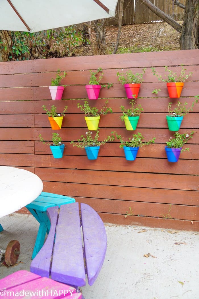 Color Blocking Flower Pots. Rainbow Vertical Garden. Colorful garden pots brighten up any outside space.