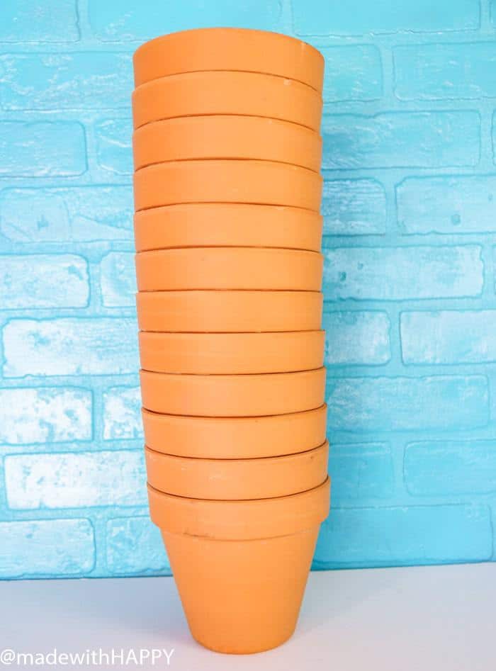 Stack of Terra Cotta Pots. Color Blocking Flower Pots. Rainbow Vertical Garden. Colorful garden pots brighten up any outside space.