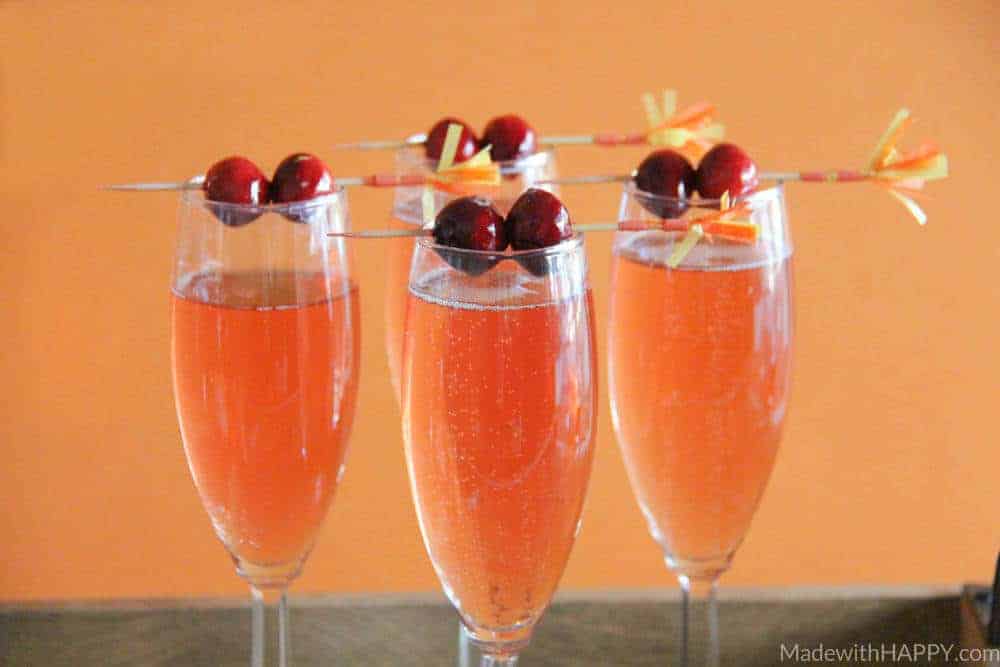 Cranberry Watermelon Champagne Cocktail | Holiday Cocktails | Cranberry Cocktails | Champagne Cocktails | www.madewithhappy.com