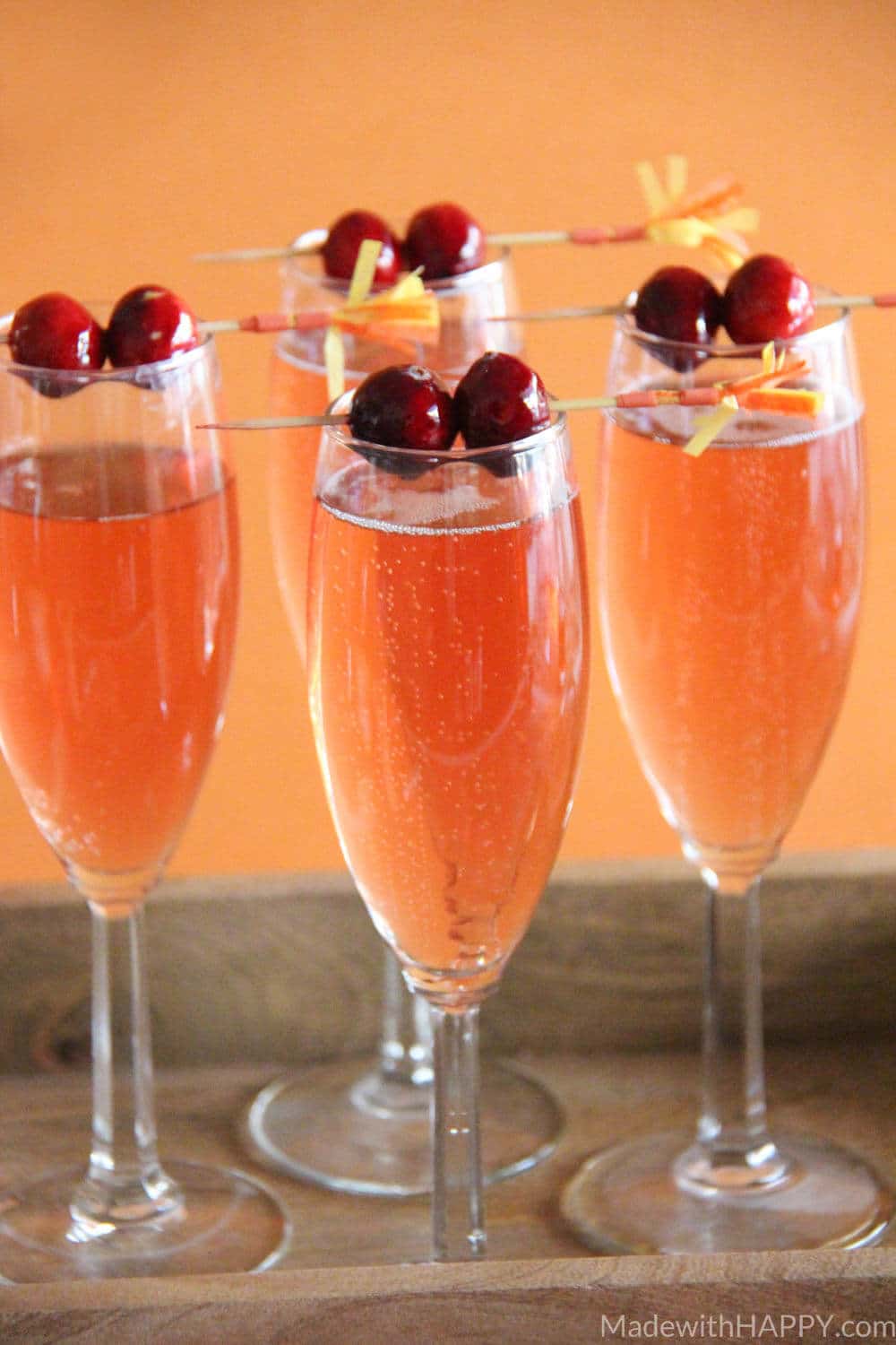 Cranberry Watermelon Champagne Cocktail | Holiday Cocktails | Cranberry Cocktails | Champagne Cocktails | www.madewithhappy.com 