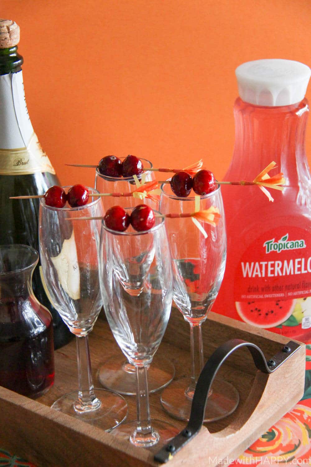 Cranberry Watermelon Champagne Cocktail | Holiday Cocktails | Cranberry Cocktails | Champagne Cocktails | www.madewithhappy.com 