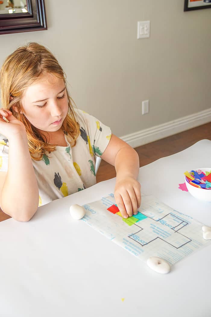 Kids Easter Craft. This Easter Suncatcher Craft is perfect kids Easter craft. We're show you just how to make a suncatcher with tissue paper.