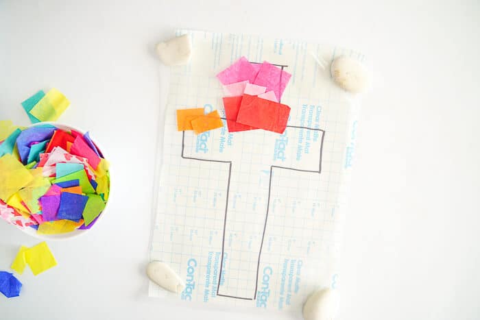 Fun Easy Kids Easter Crafts. This Easter Suncatcher Craft is perfect kids Easter craft. We're show you just how to make a suncatcher with tissue paper.