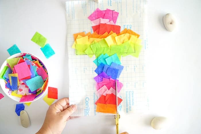 Kids Tissue Paper Craft Project. This Easter Suncatcher Craft is perfect kids Easter craft. We're show you just how to make a suncatcher with tissue paper.