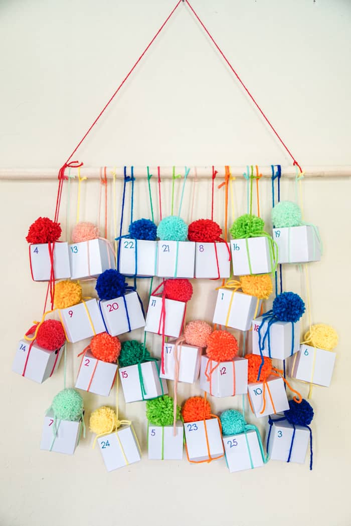 Colorful boxes hanging on a wall