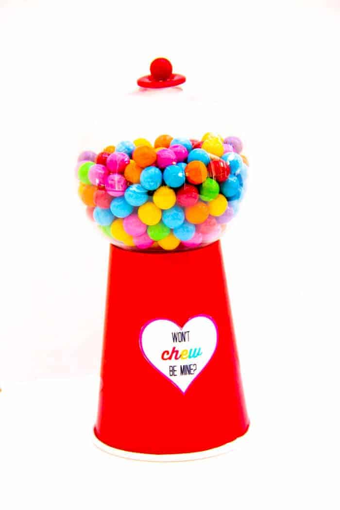 There are so many fun make your own Valentine option.  We are in love with this DIY Gumball Machine with free printable.. We're sharing how to make a gumball machine along with these super cute "won't chew be mine" free printables. www.madewtihhappy.com