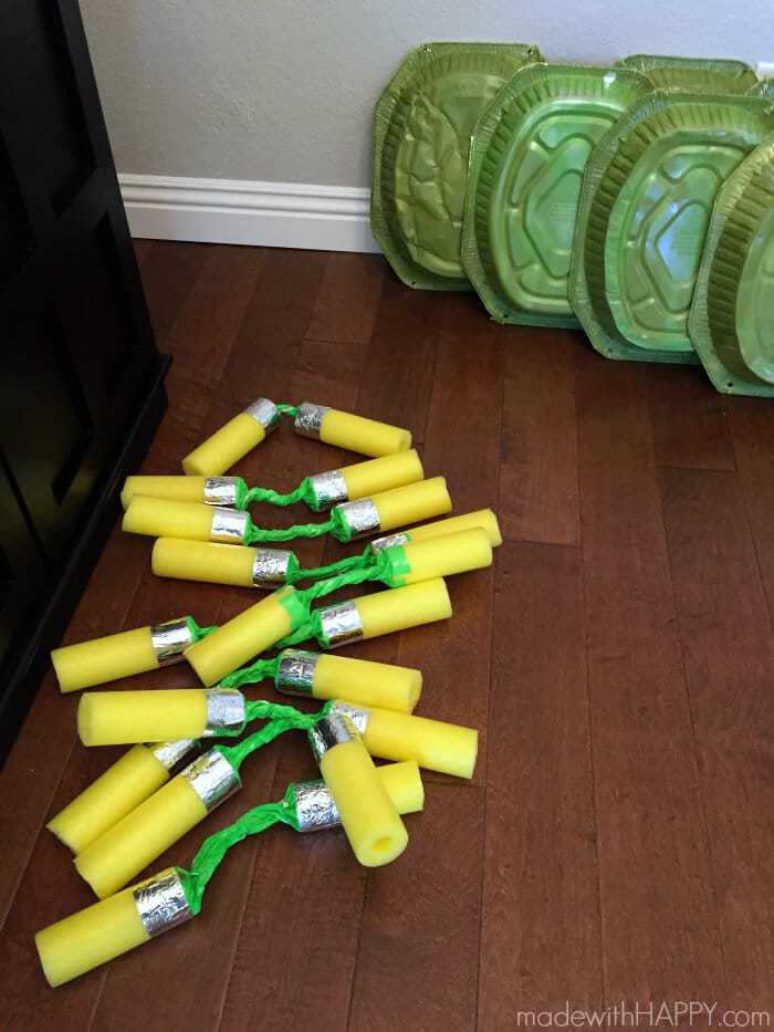 DIY Teenage Mutant Ninja Turtle Nunchucks | Teenage Mutant Ninja Turtle Party Ideas | TMNT Party Ideas | TMNT Shells | Pool Noodle Nunchucks | Ninja Turtle Cookies | www.madewithhappy.com