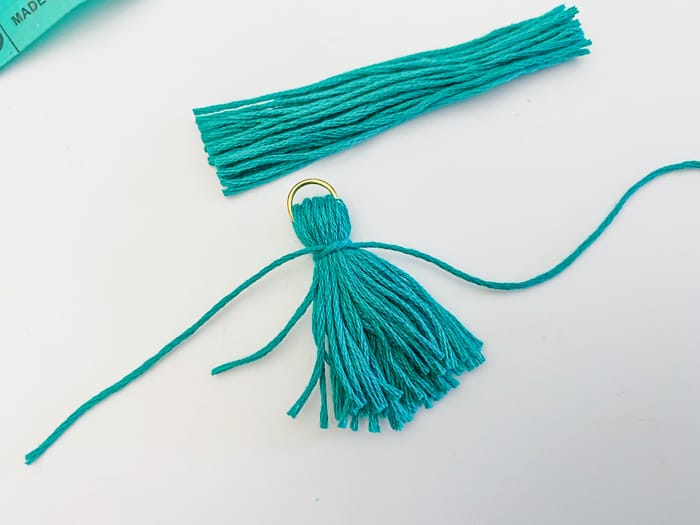 tie a knot at top of tassel