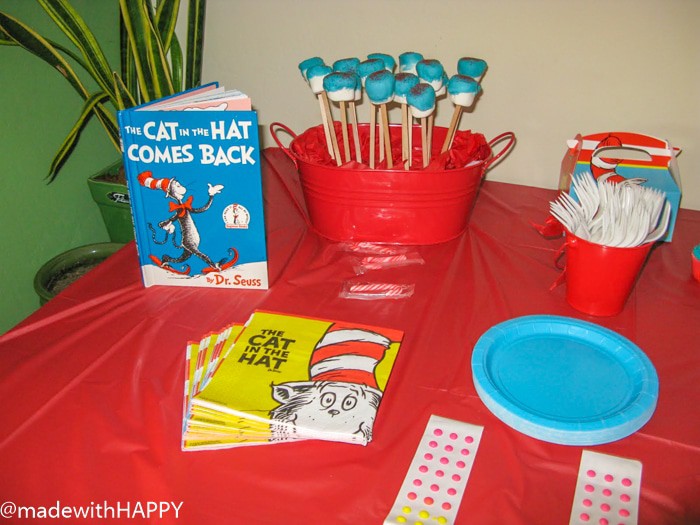 Dr Seuss Birthday Party for a two year old. Fun Decoration ideas with The Cat in the hat for a Dr. Seuss birthday party. Dr. Seuss Party Ideas. Dr. Seuss Party Supplies