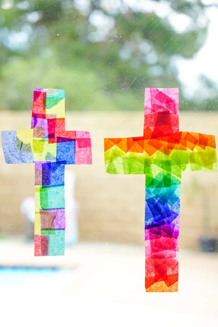 Cross Suncatcher craft. This Easter Suncatcher Craft is perfect kids Easter craft. We're show you just how to make a suncatcher with tissue paper.