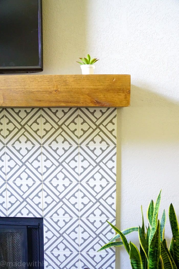 Modern Fireplace Makeover. Just like cement tile fireplace, but Portuguese ceramic tile fireplace. Modern Grey and white patterned tile. Rustic Mantel. Chunky reclaimed wood mantel. 