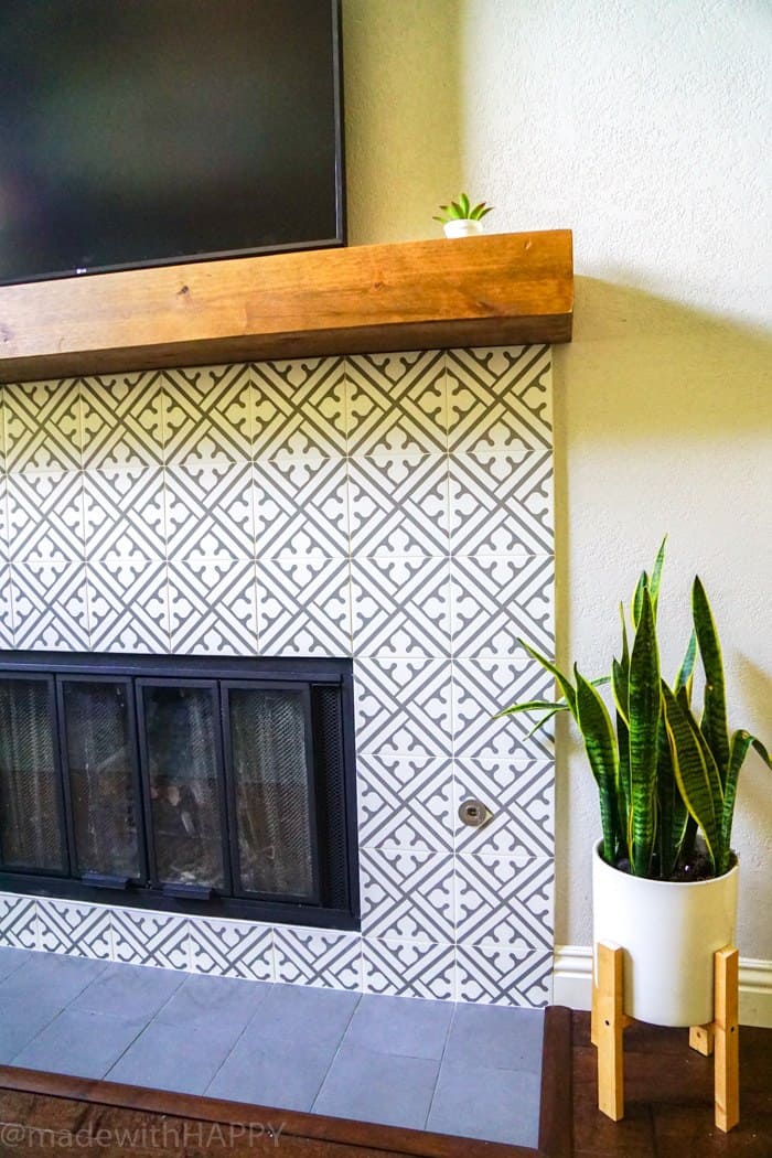 Modern Fireplace Makeover. Just like cement tile fireplace, but Portuguese ceramic tile fireplace. Modern Grey and white patterned tile. Rustic Mantel. Chunky reclaimed wood mantel. 