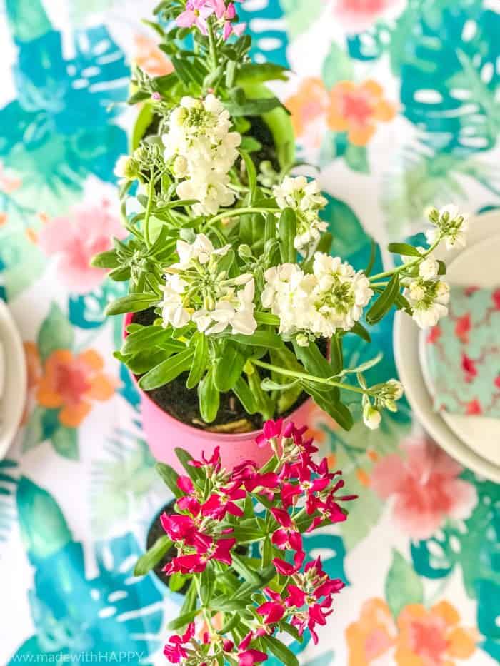 These Easter centerpieces are perfect for your Easter table.  Sweet and Simple DIY Easter Decorations. Easter tablescapes full of flowers and fun. 