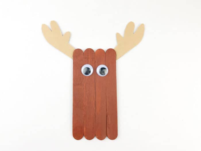 glue antlers to back of brown popsicle sticks