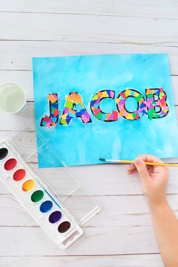 Rainbow Name Craft for Kids with blue watercolor