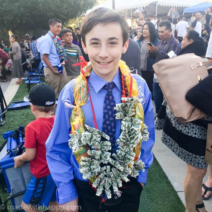 Young Man Wearing Money Lei