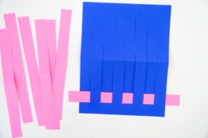 two strips weaved into paper weave