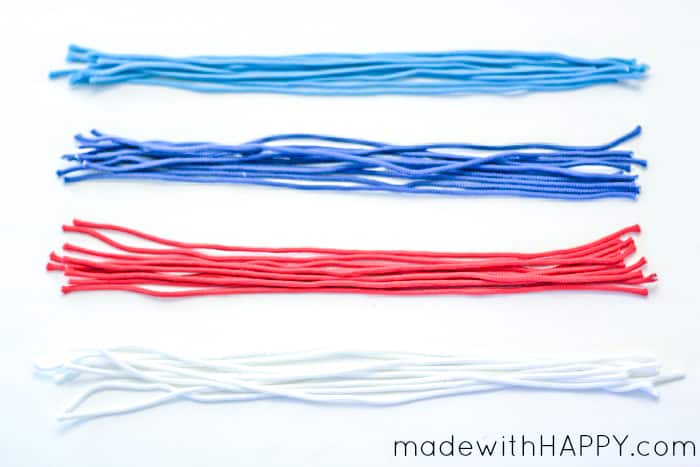 cut pieces of red white and blue paracord