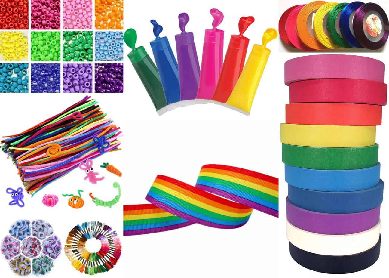 A colorful assortment of craft supplies, including beads, rainbow ribbons, colored balloons, skeins, and spools of ribbon. This dazzling array of craft supplies is arranged in an eye-catching display, showcasing a vibrant mix of hues and shapes.