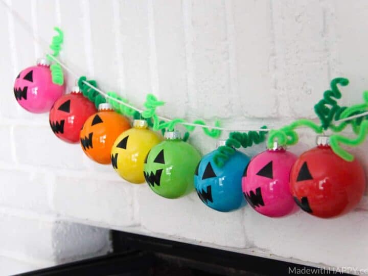 Rainbow Holiday Garland | Plastic Ornament Garland | Colorful Halloween Decorations | Bright Colored Ornaments | www.madewithhappy.com