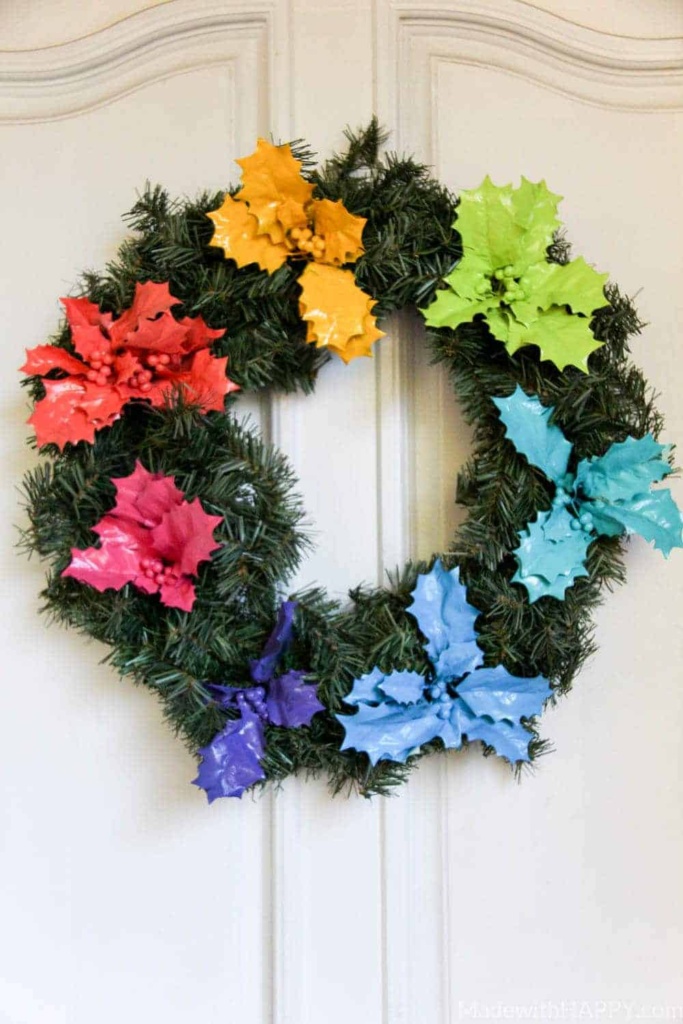 Rainbow Holly Wreath | Rainbow Wreaths | Christmas gone rainbow | Bright colorful Christmas | DIY Christmas Wreath | www.madewithhappy.com