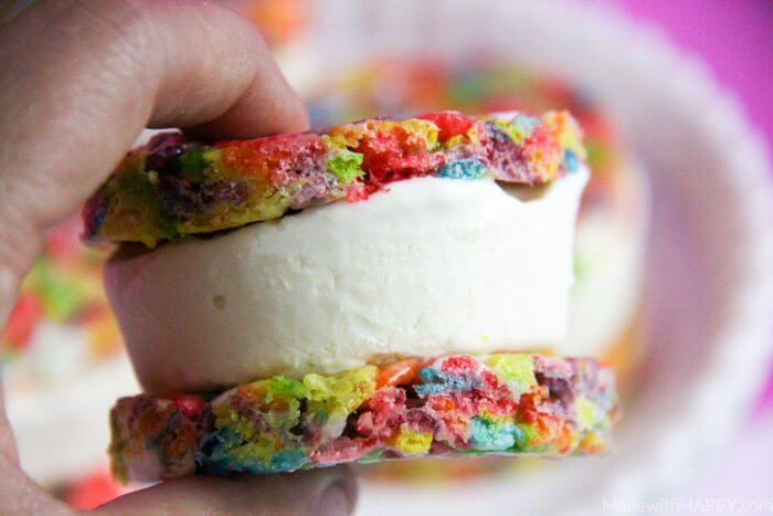 Rainbow Ice Cream Sandwich | Ice cream sandwich recipes | Rice Crispy Treats | Rainbow Treats | St. Patrick's Day Desserts | Rainbow Rice Crispy Treats | www.madewithhappy.com