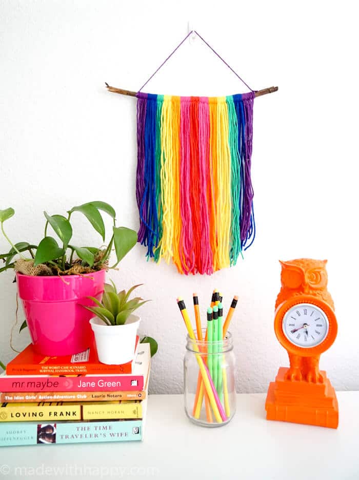 DIY Yarn Wall Hang Tapestry Tutorial. Simple Rainbow Macrame. Colorful Yarn Wall Hanging Tapestry Tutorial. www.madewithhappy.com