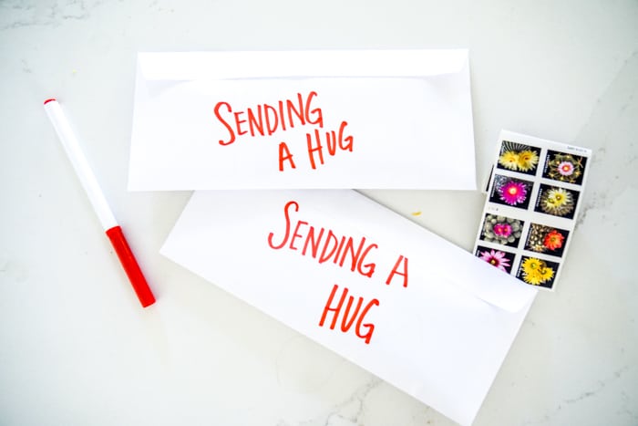 Envelope with real size hugs