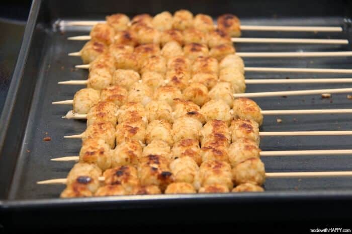 To make Loaded Tater Tots, you'll want to put your cooked tater tots onto individual skewers.