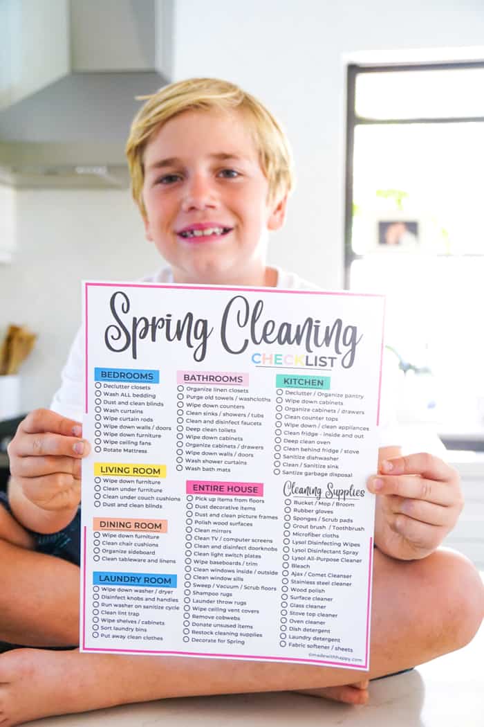 Spring Cleaning Checklist - Boy holding