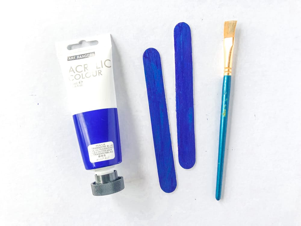 Paint tow sticks blue