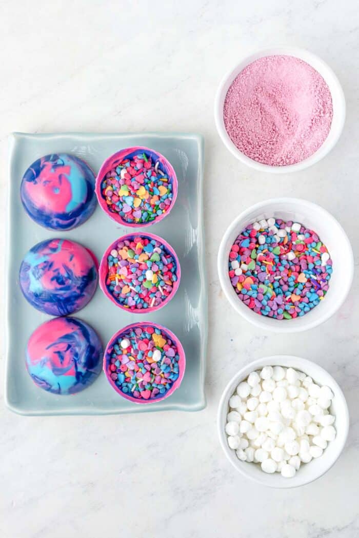 Add unicorn sprinkles to chocolate cup