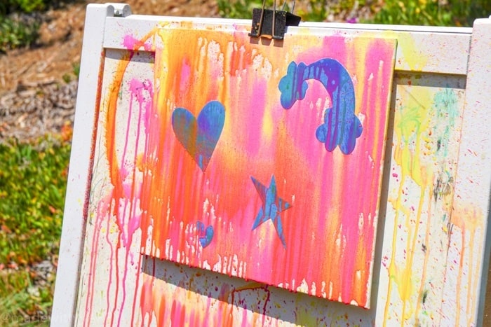 Mixed Media Kids Activities. Water gun painting. Looking for Summer activities for the kids? The kids LOVE water gun painting throughout the Summer.