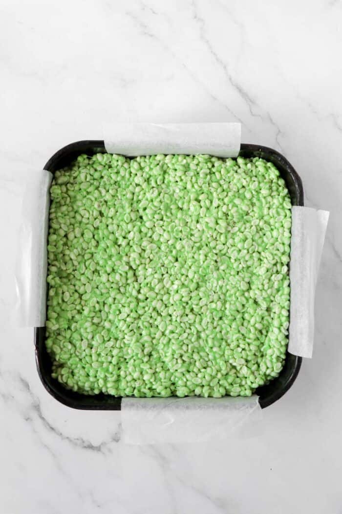 add green rice krispies to pan