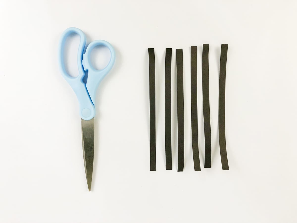 cut black paper in thin strips