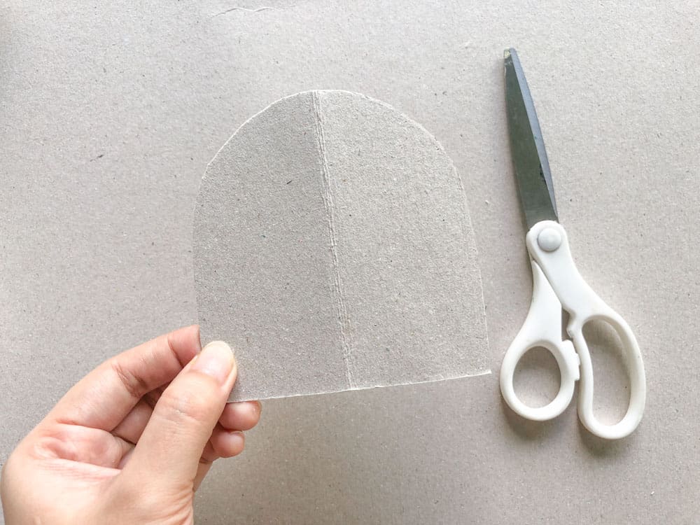 cut cardboard with scissors