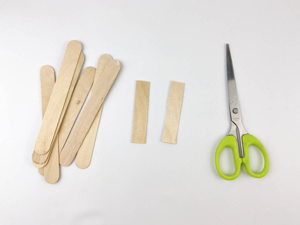 cut craft sticks for ghost craft