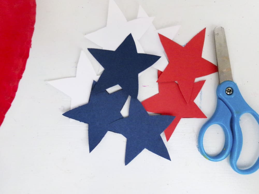 cut out stars from red, white and blue paper