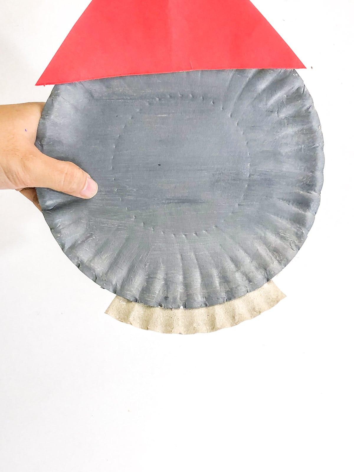 cut second paper plate for rocket ship