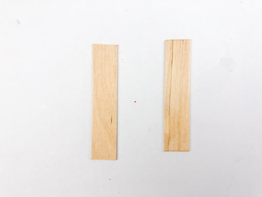 cut tips off both sides of popsicle sticks