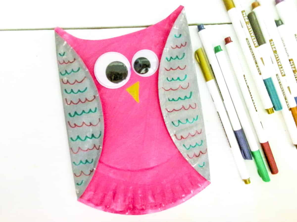 decorate owl wings and beak for paper owl