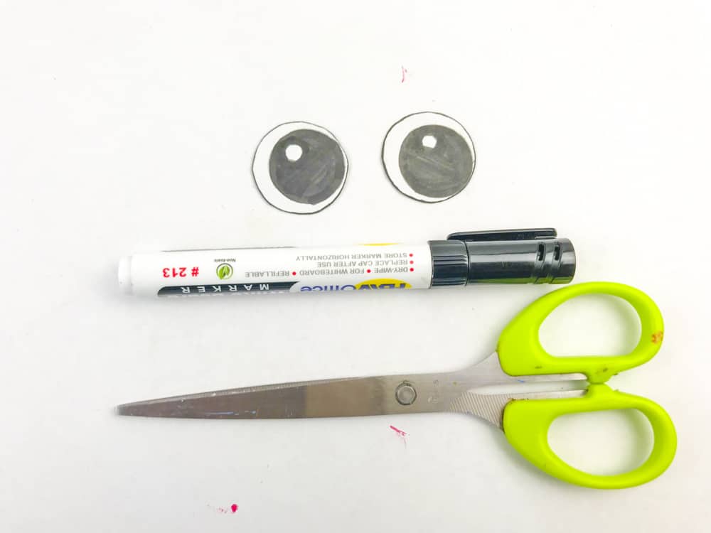 draw crab eyes from white paper or googly eyes