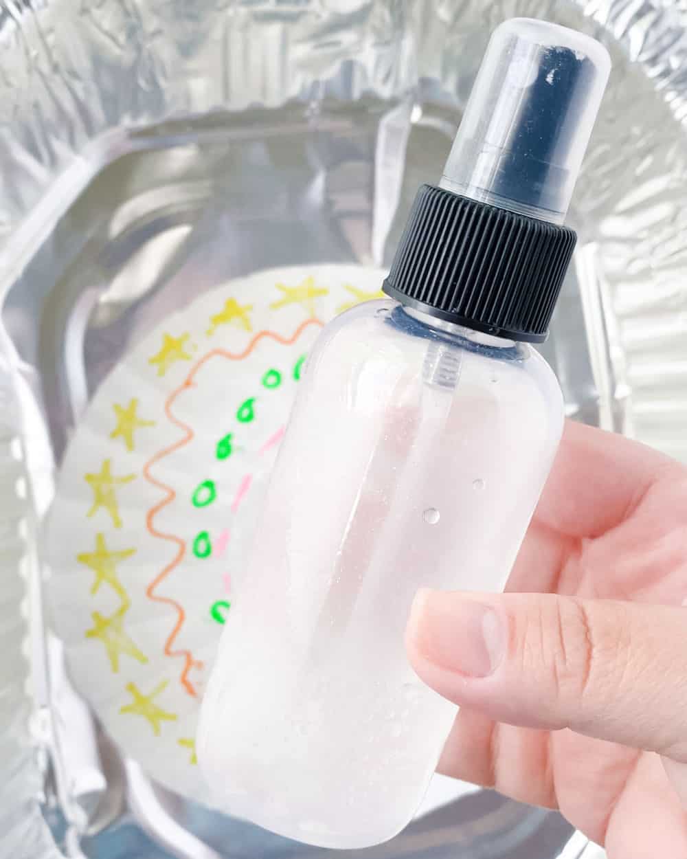fill spray bottle with water